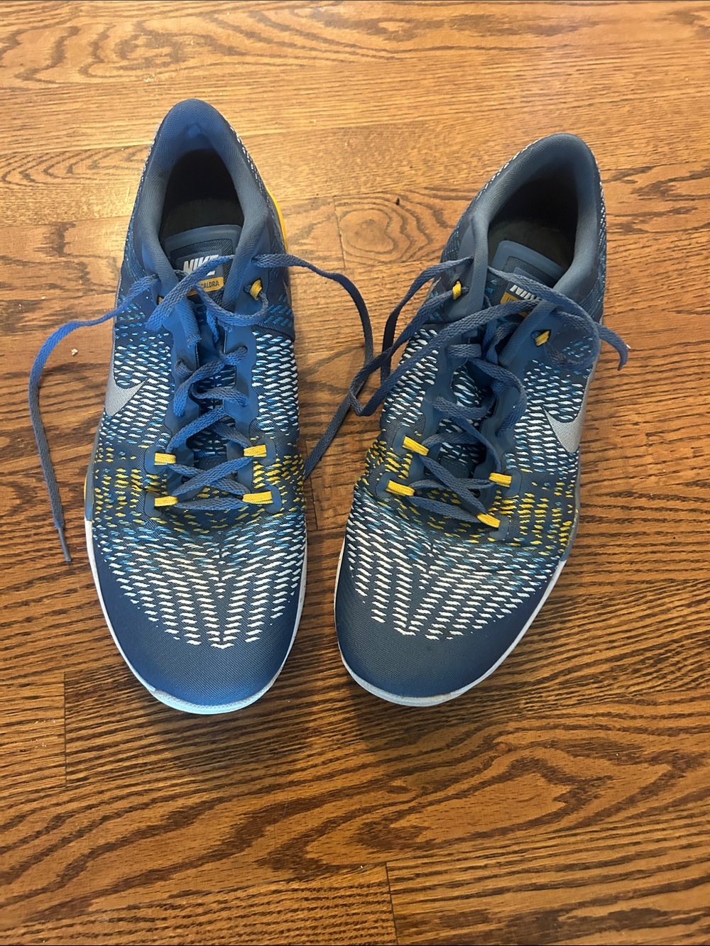 Nike Men’s Navy Blue Athletic Sneakers with Yellow Accents